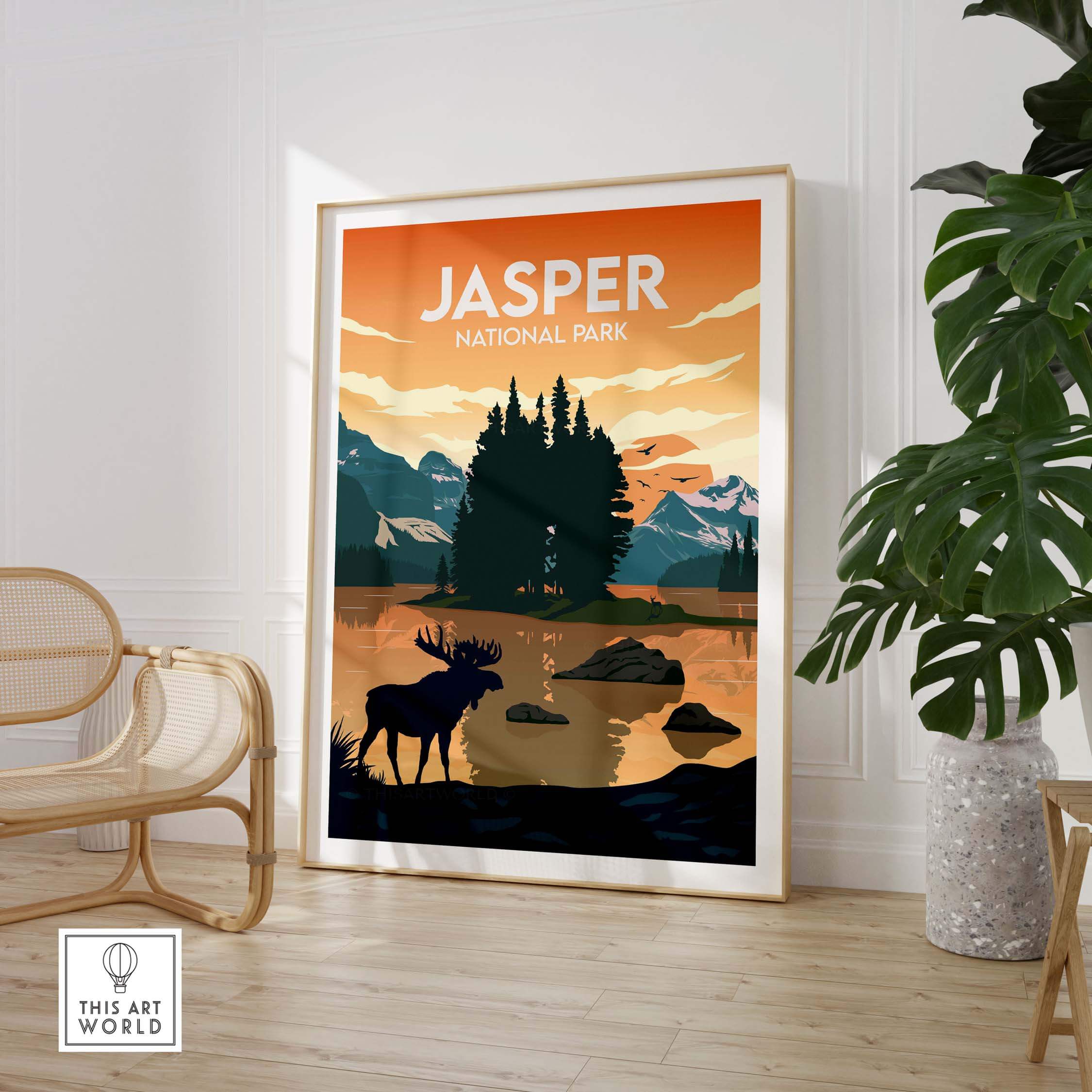 Jasper National Park poster featuring a serene landscape with a moose, framed in a stylish interior setting.