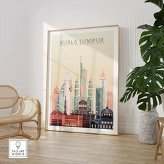 Kuala Lumpur skyline wall art print featuring iconic architecture in warm pastel tones, framed and ready for display.