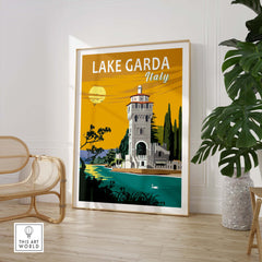 Lake Garda Print Italy Poster featuring a vintage design in a stylish home setting with greenery.