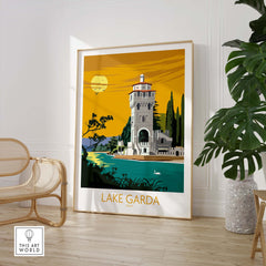 Lake Garda Italy poster print featuring a scenic tower by the lake with vibrant yellow skies and lush greenery.