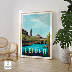 Leiden Netherlands print featuring a scenic view with a blue canal and traditional buildings framed in a stylish interior