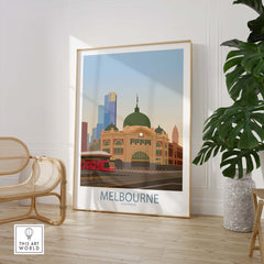 Stylish Melbourne poster print featuring iconic architecture and vintage travel vibes, displayed in a modern interior.