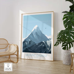 Mount Everest print travel poster in a stylish room, framed art with a mountain design and soft blue tones.