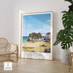 Newquay Cornwall travel poster showcasing a beach landscape, framed in a stylish setting.