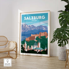 Salzburg travel poster print featuring mountains and architecture in a minimalist design, framed and displayed in a stylish interior.