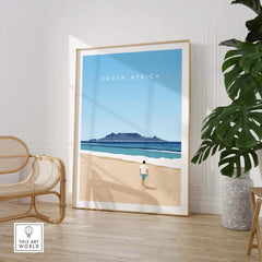 South Africa Travel Poster Print featuring a person walking on the beach with Table Mountain in the background.