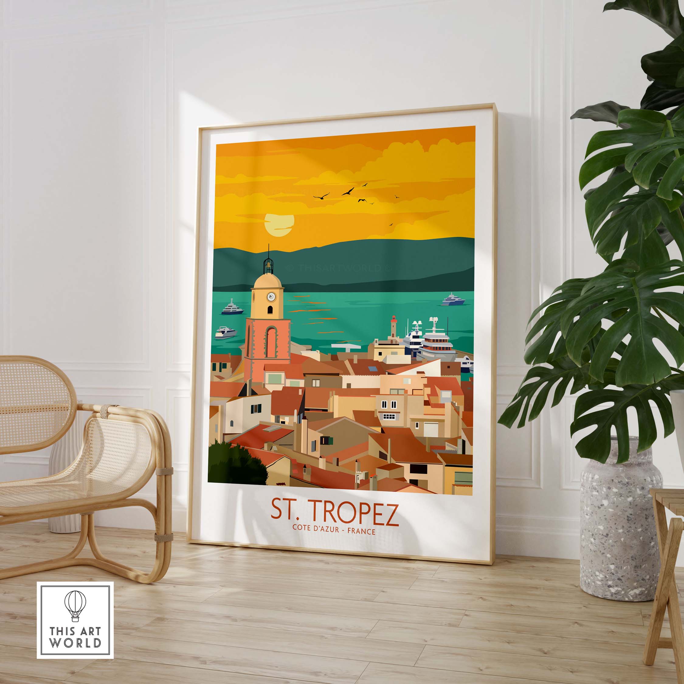 St Tropez Poster Print showcasing a vibrant vintage travel scene of the coastal town in France, framed on a wall.
