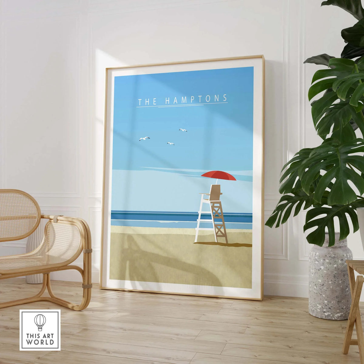 Framed The Hamptons Print showcasing a minimalist beach scene with a lifeguard tower and ocean view.