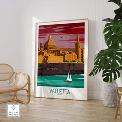 Valletta Print Malta Poster featuring a vintage-inspired design with colorful cityscape and sailboat in a modern interior setting.