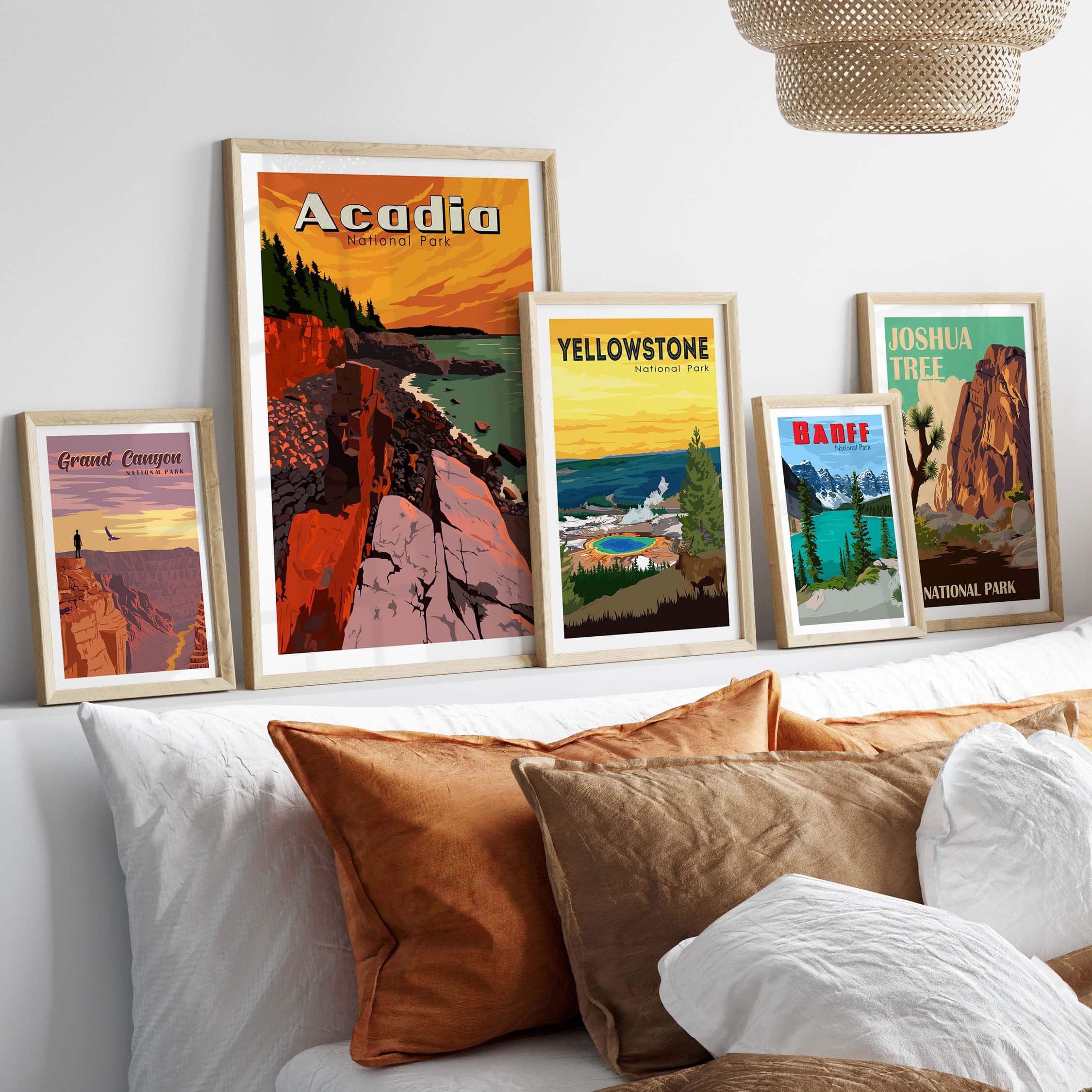 Framed vintage National Park prints, including Acadia, Yellowstone, and Joshua Tree, displayed in a stylish decor setting.