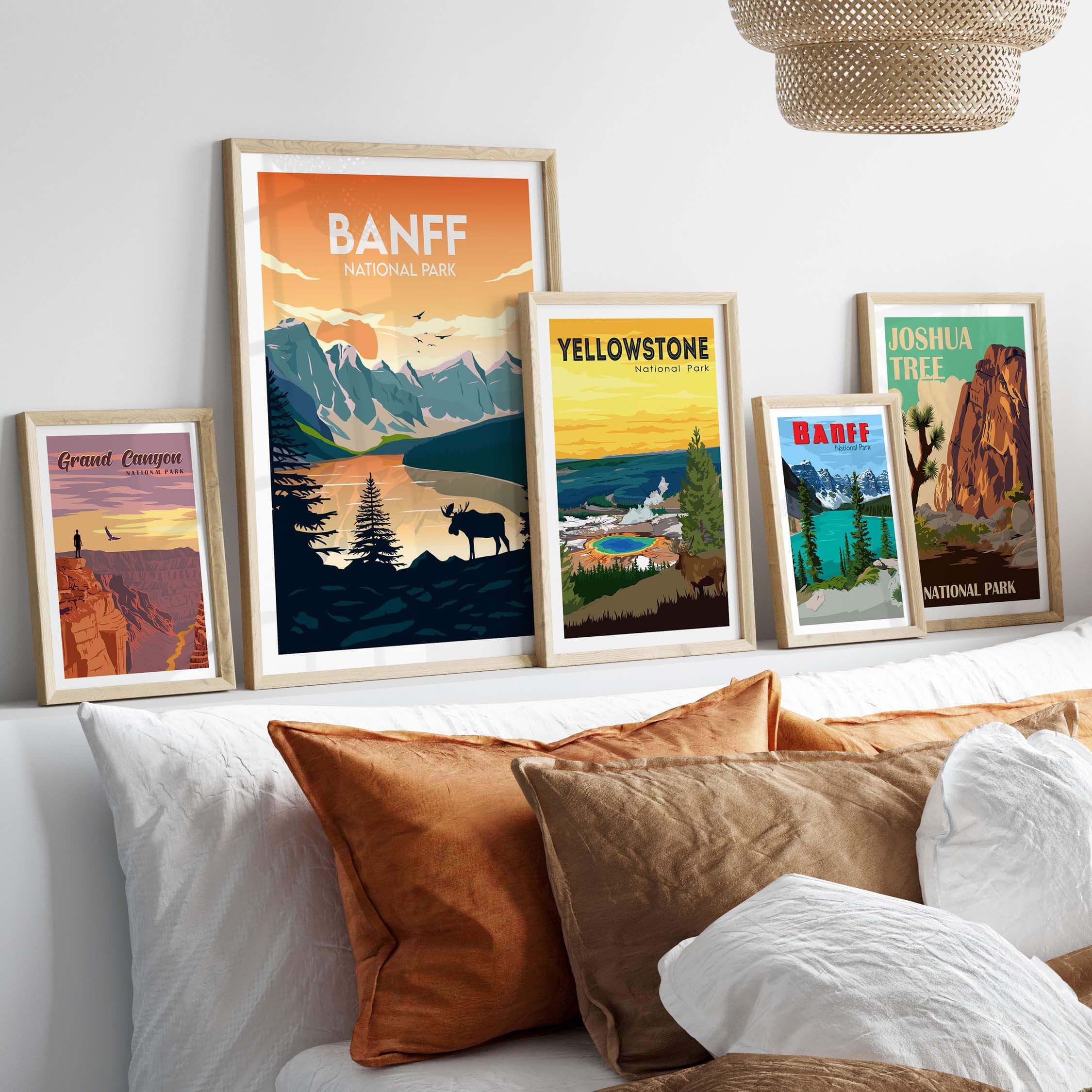 Framed Banff, Yellowstone, and Joshua Tree National Park posters displayed in a stylish home setting.