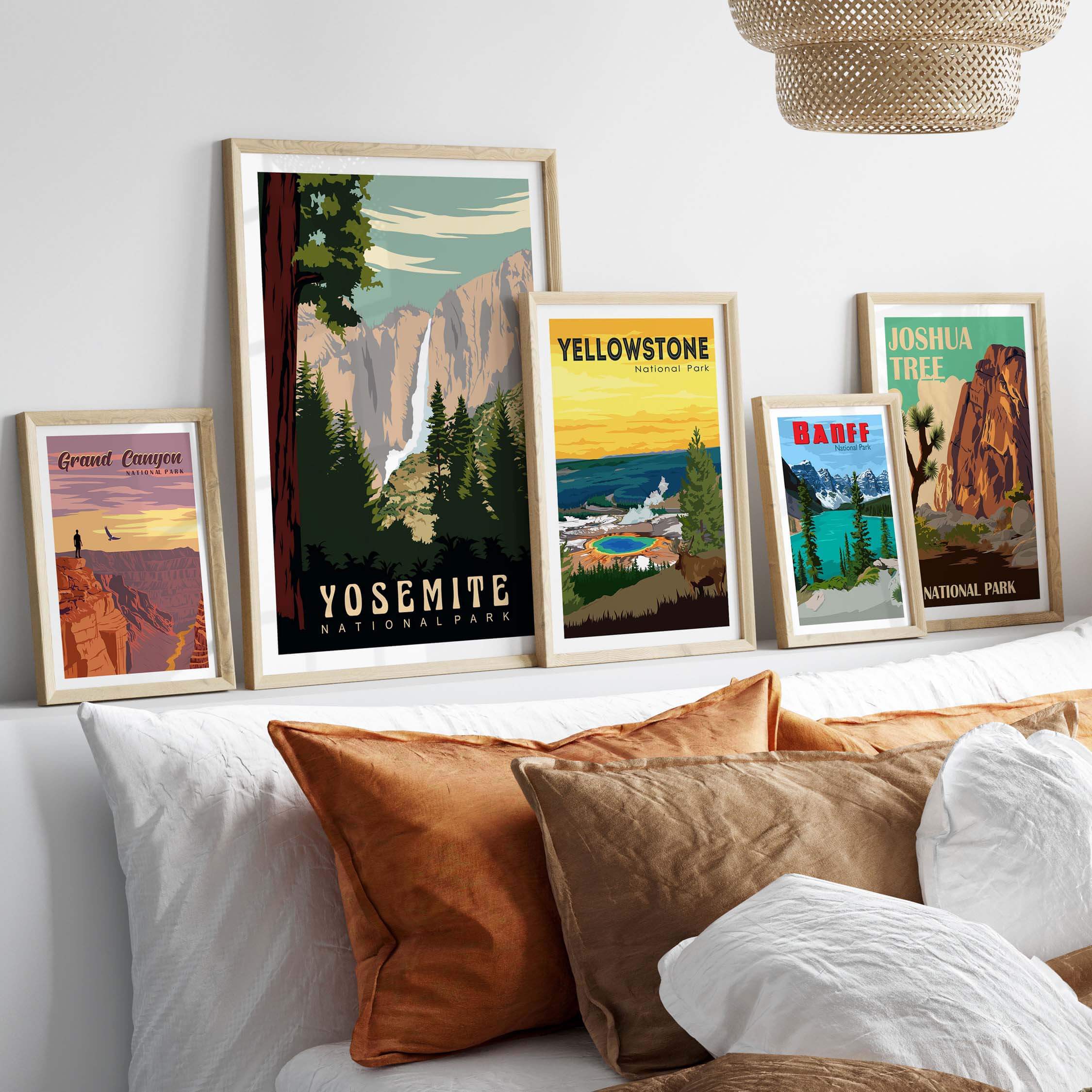 Display of framed Yosemite National Park and vintage national park prints on a stylish home decor shelf.