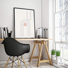 Mid-century modern abstract art print displayed in a stylishly designed home office with a sleek black chair.