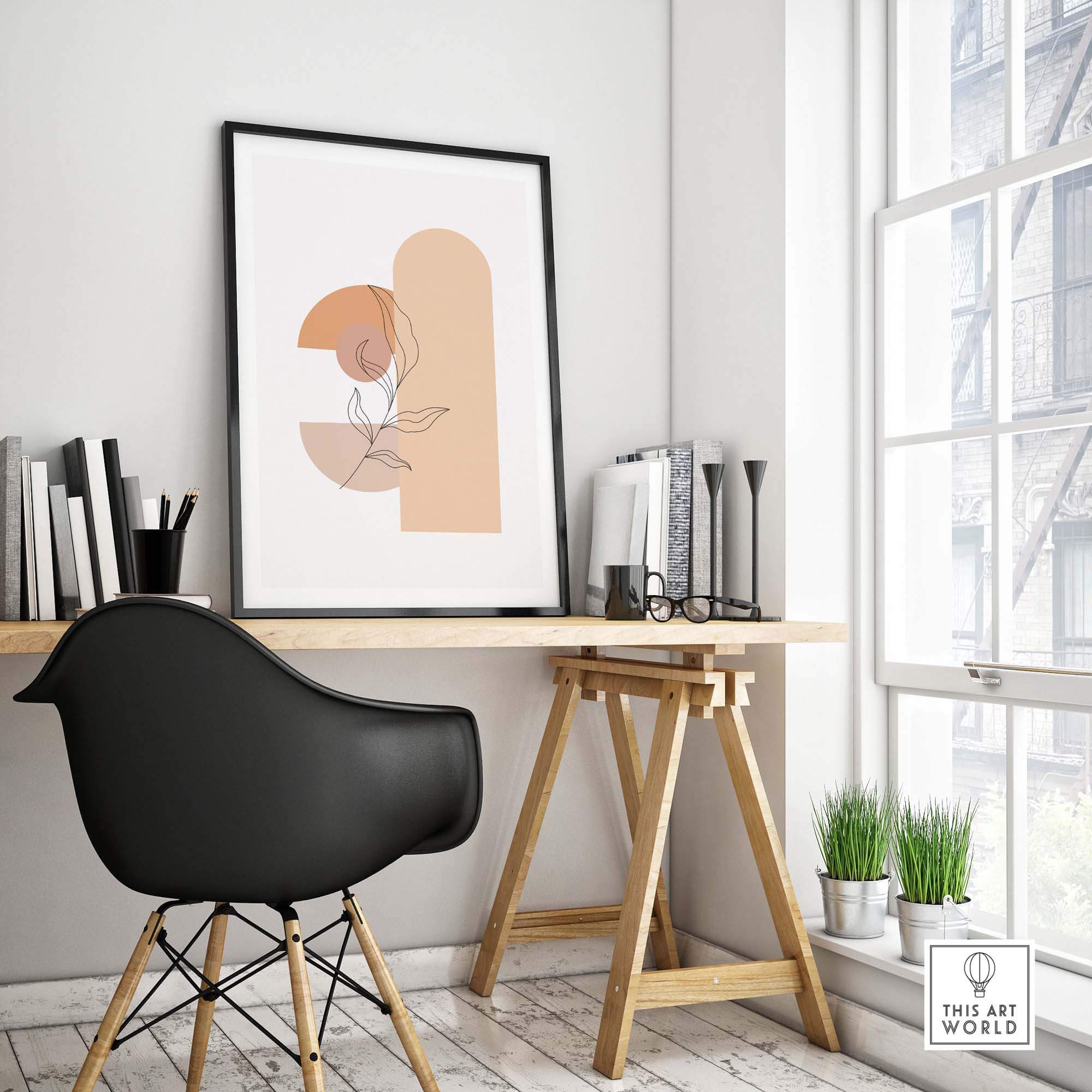 Mid century print featuring abstract shapes and floral design in a stylish workspace environment.