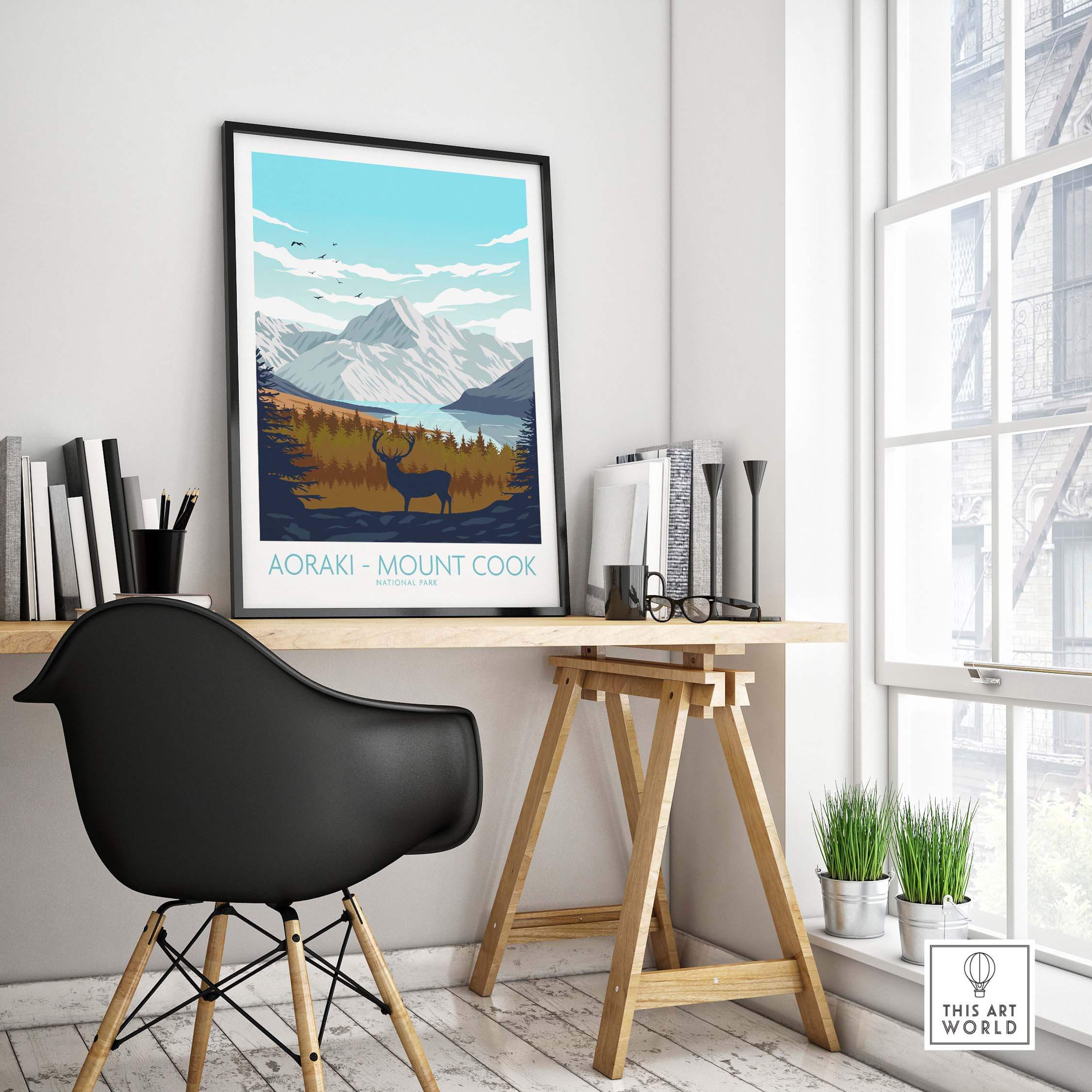 Mount Cook Aoraki poster displayed in a stylish workspace, featuring vintage art and natural scenery.