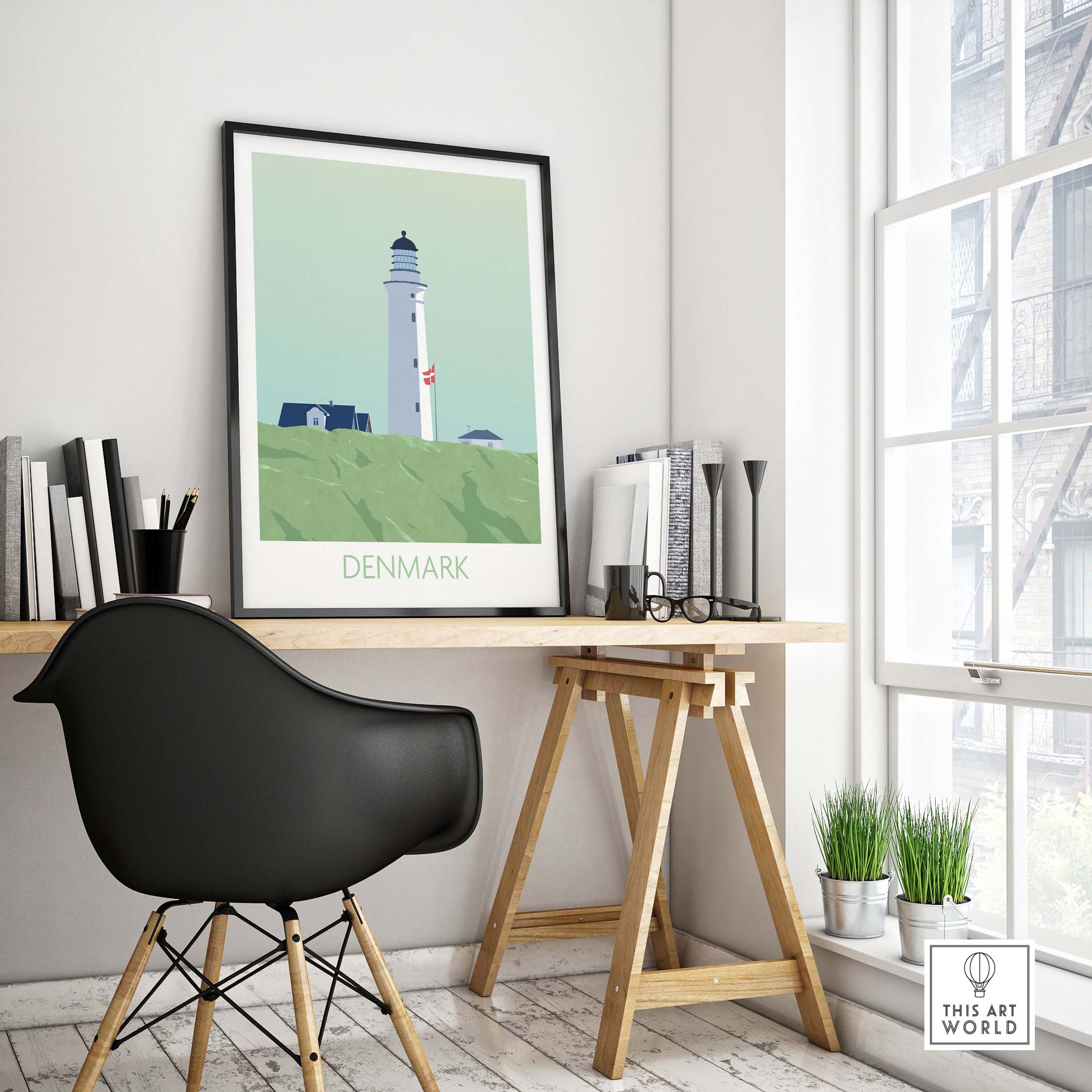 Denmark poster print featuring a lighthouse, displayed in a modern home office setting.