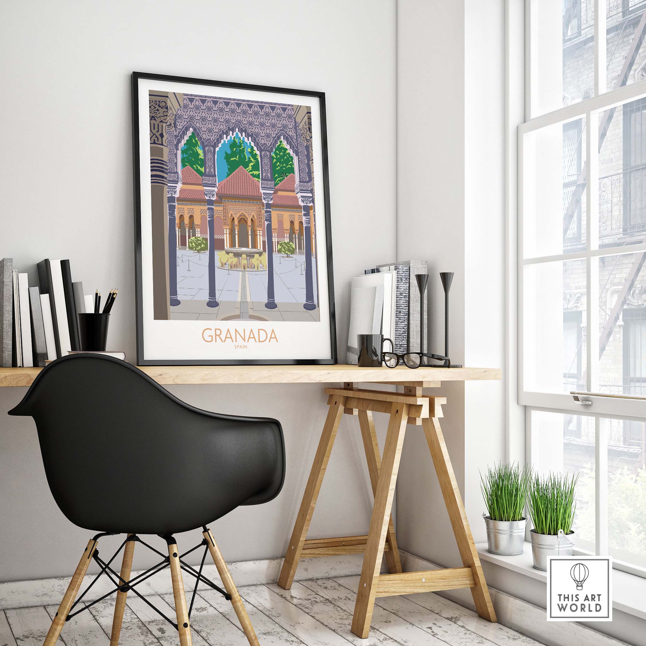 Granada Spain poster print displayed in a bright home office setting with a stylish black chair.