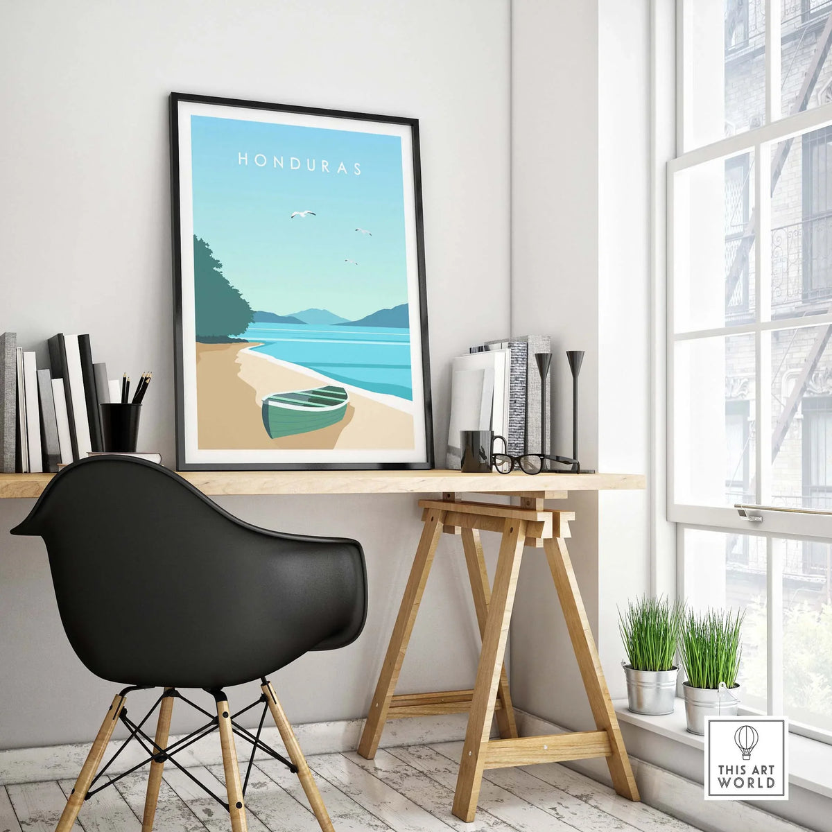 Honduras Print travel poster framed in a stylish office setting with a black chair and natural light.