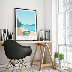 Honduras Poster Caribbean Print framed on a minimalist desk setup, showcasing stylish wall art for wanderlust travel enthusiasts.
