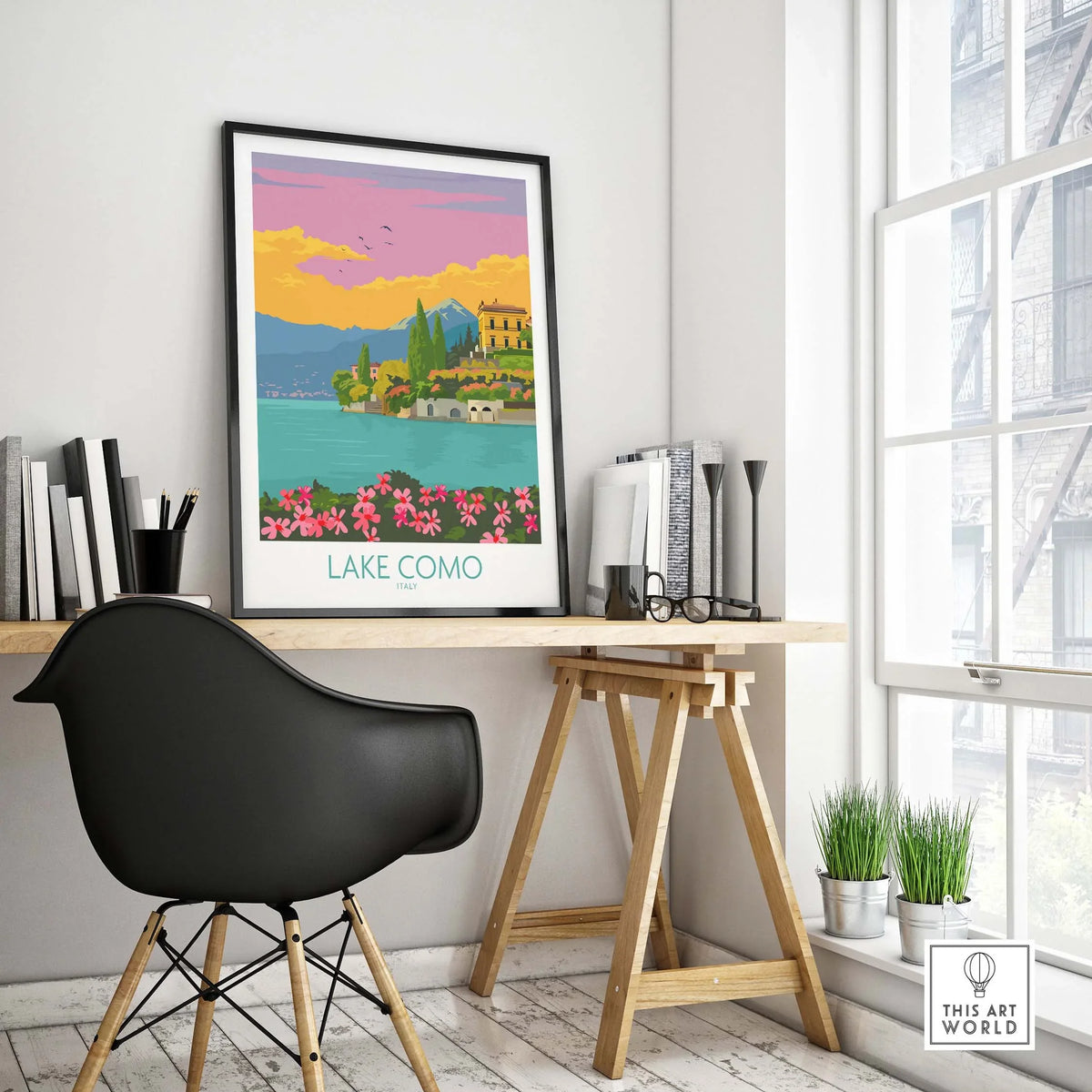 Lake Como Italy poster displayed in a stylish office setting, featuring vintage-inspired artwork with vibrant colors.