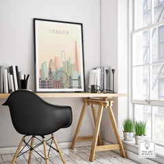 London skyline print wall art displayed in a modern workspace featuring iconic buildings in warm pastel tones.