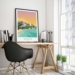 Skiathos wall art print displayed in a minimalist home office, featuring a colorful Greece poster.