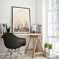 Madrid Skyline Print displayed in a stylish home office, showcasing iconic architecture in pastel colors.