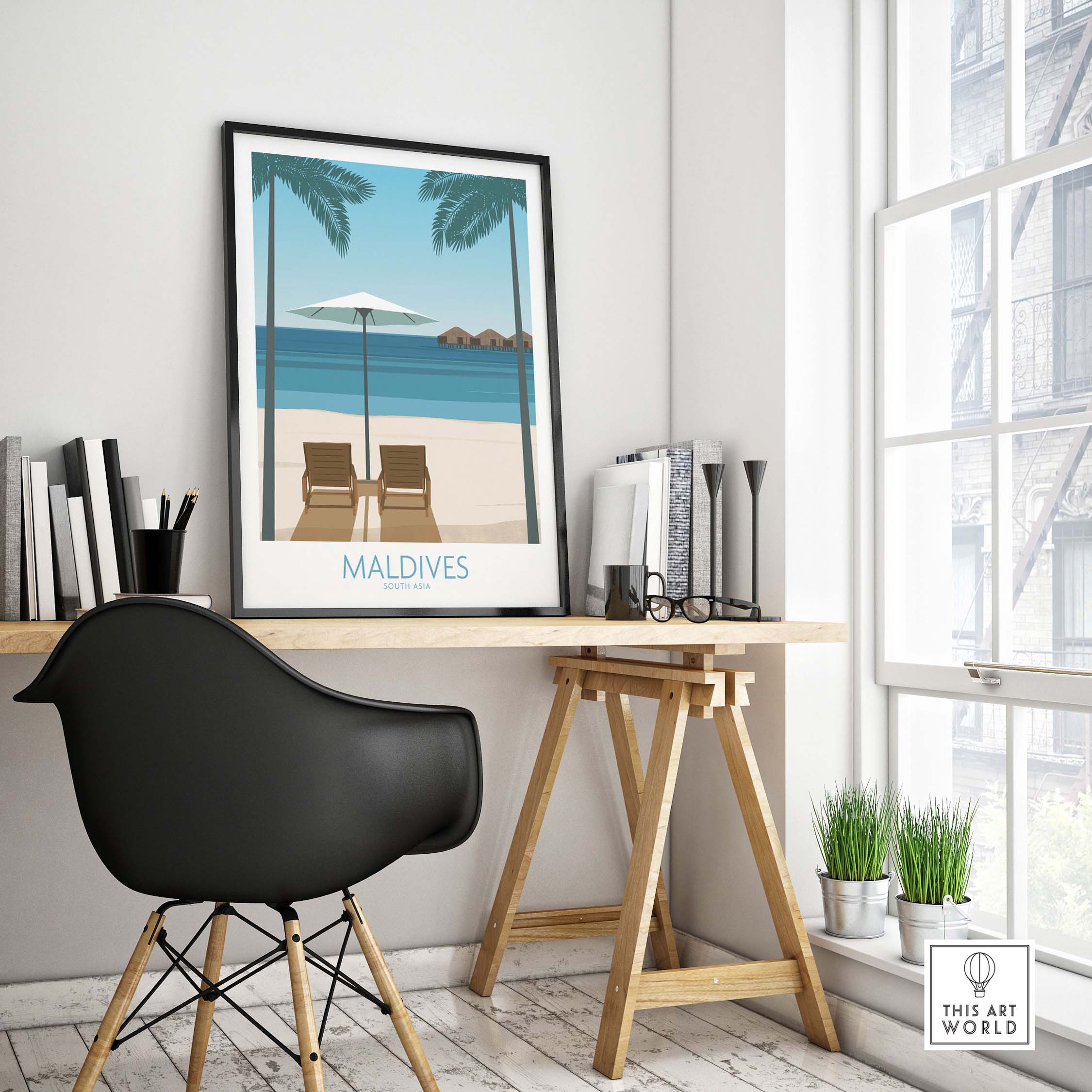 Maldives Print travel poster displayed in a stylish home office with beach chairs and serene ocean view.