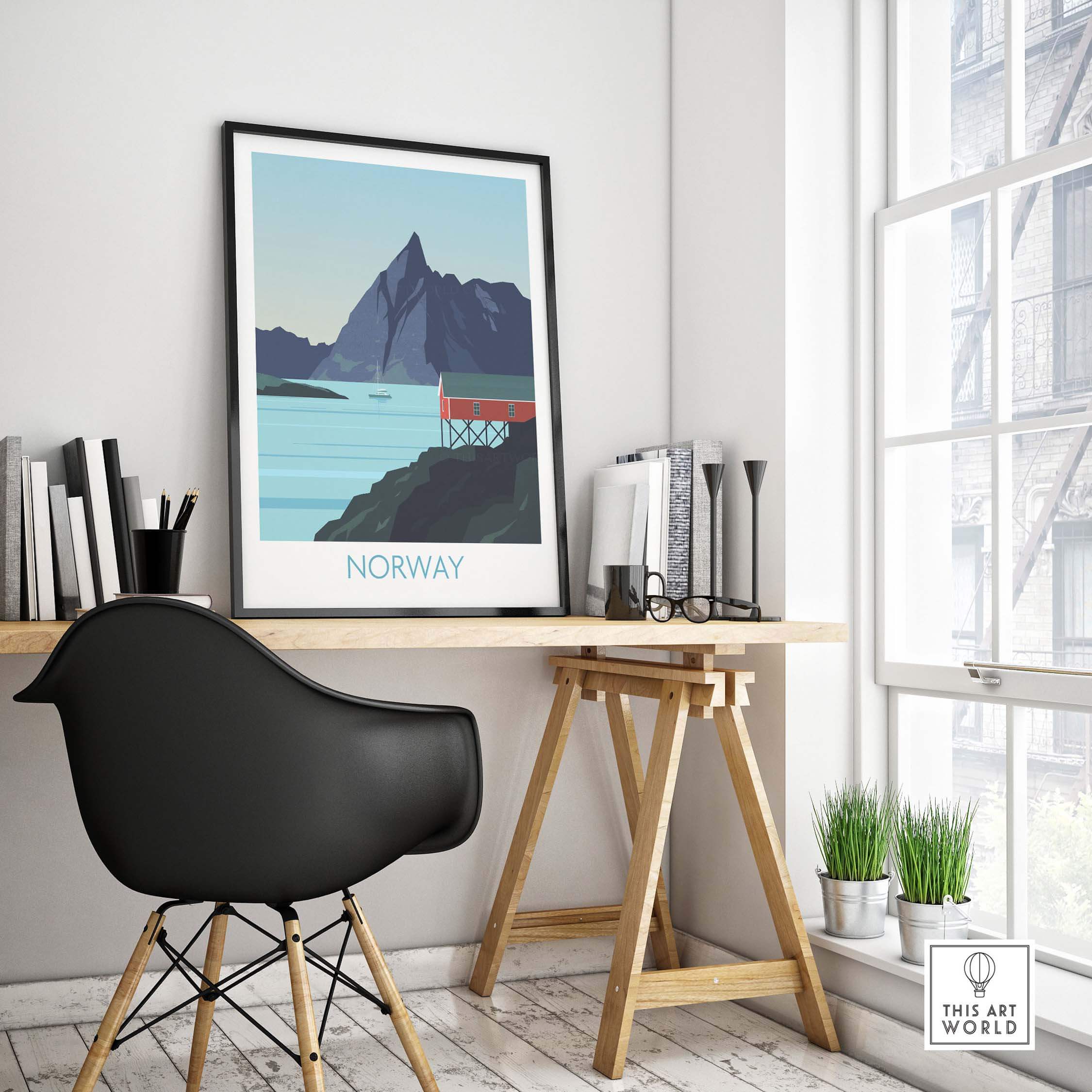 Norway print travel poster displayed in a stylish office featuring a mountain and red cabin design.