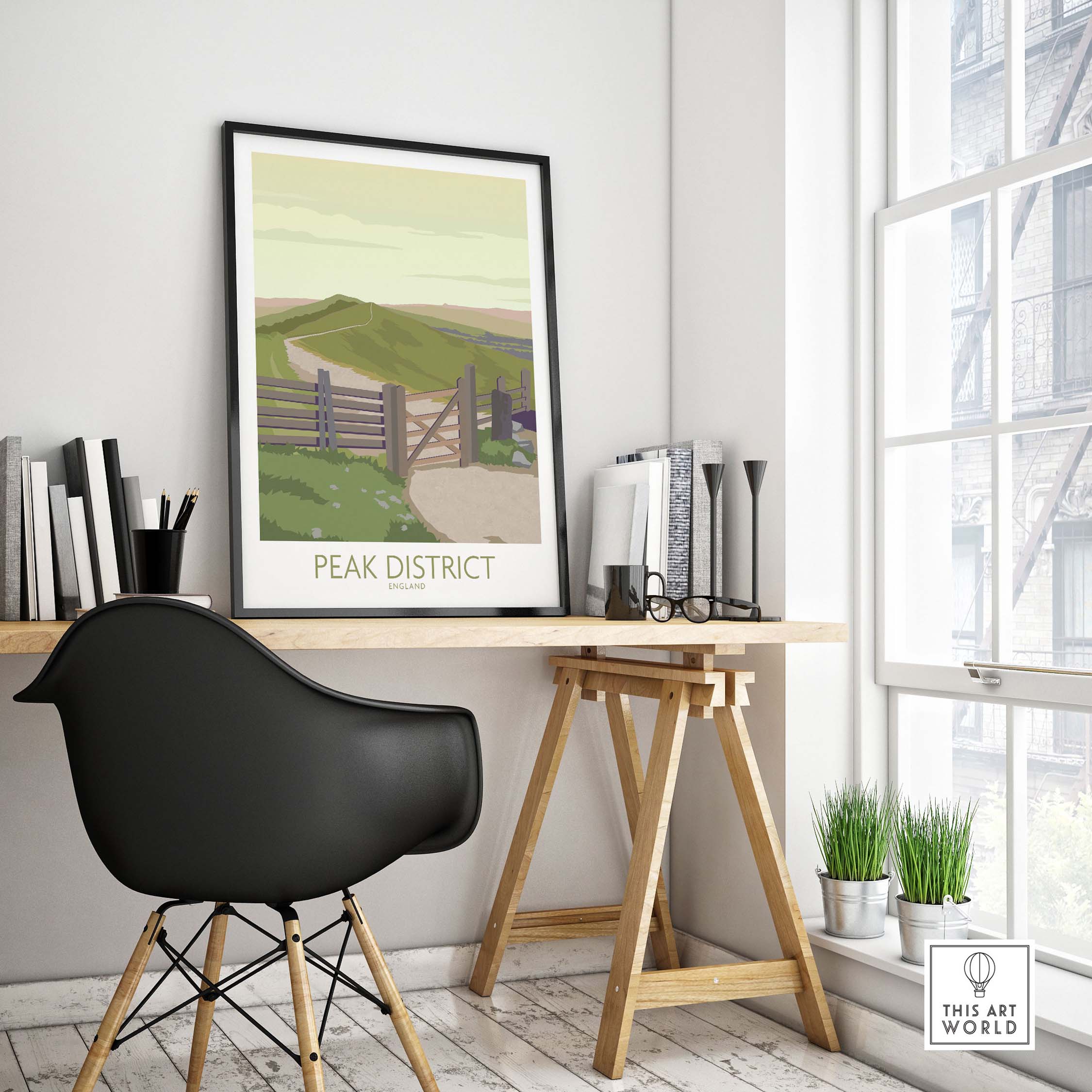 Peak District Art Print displayed in a modern workspace, showcasing a vintage-inspired travel poster.