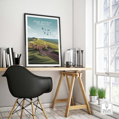 Peak District National Park poster in a modern workspace, showcasing minimalist wall art and nature inspiration.