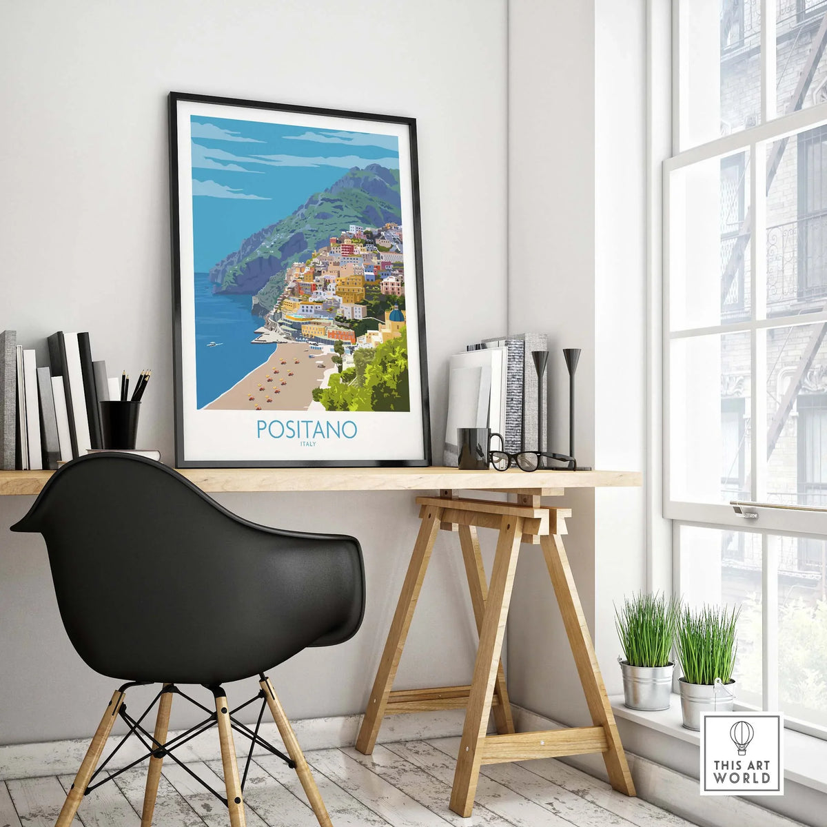 Positano travel poster displayed in a stylish home office, showcasing vibrant Amalfi Coast scenery.