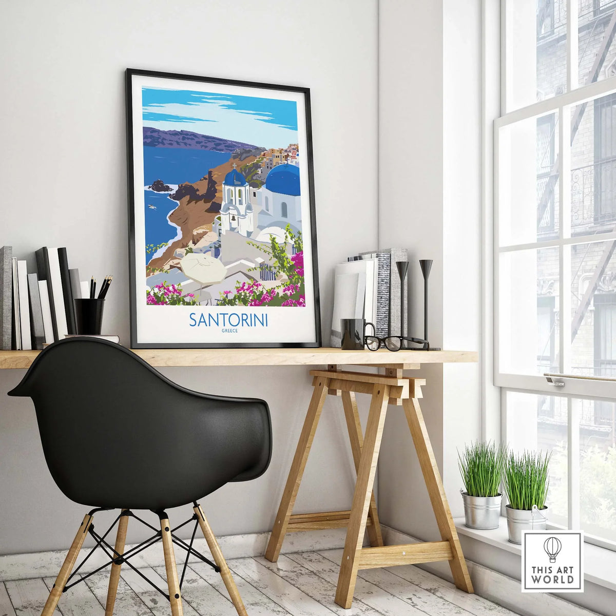 Santorini Print Travel Poster displayed in a stylish home office with a black chair and wood desk.