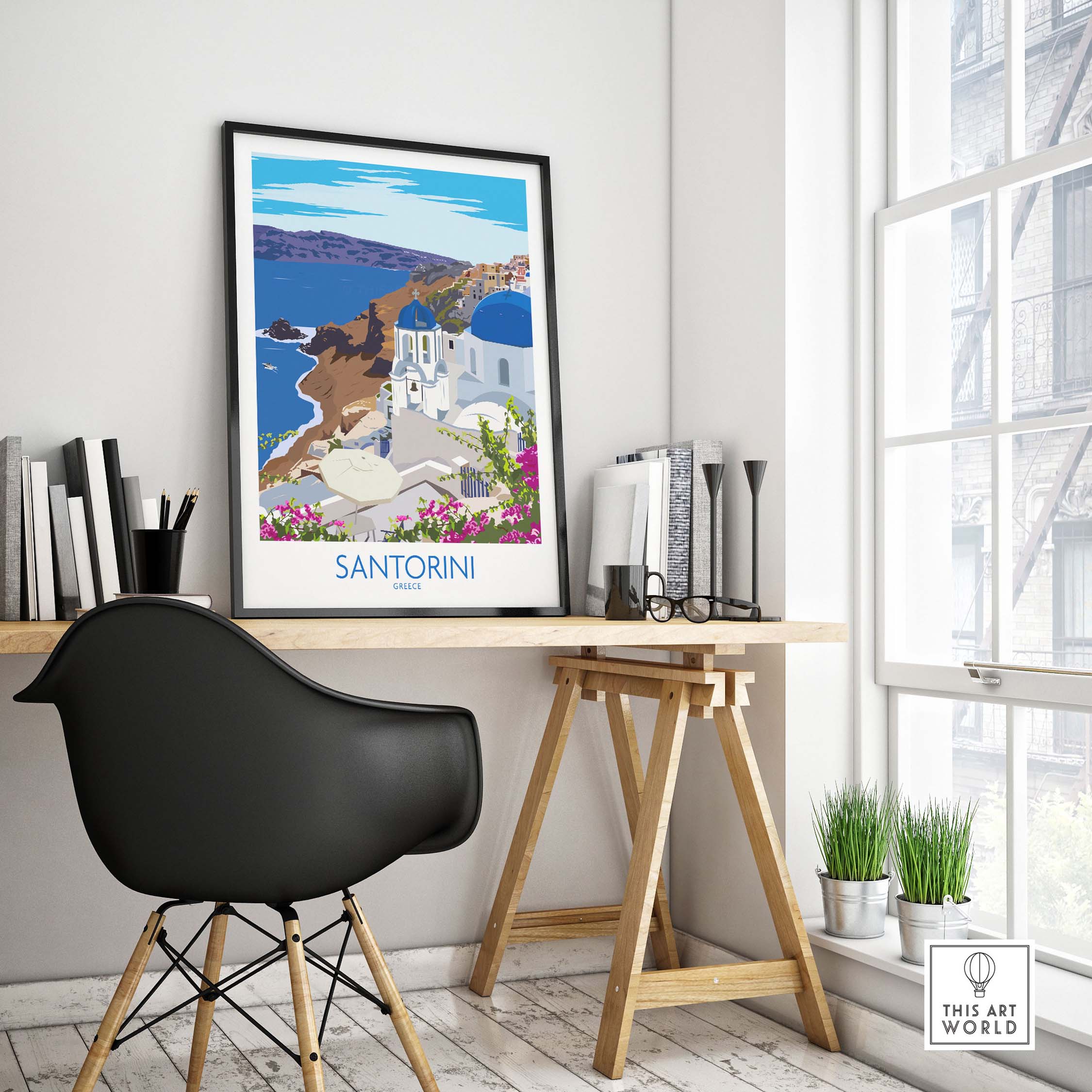 Santorini Print Travel Poster displayed in a stylish home office with a black chair and wood desk.