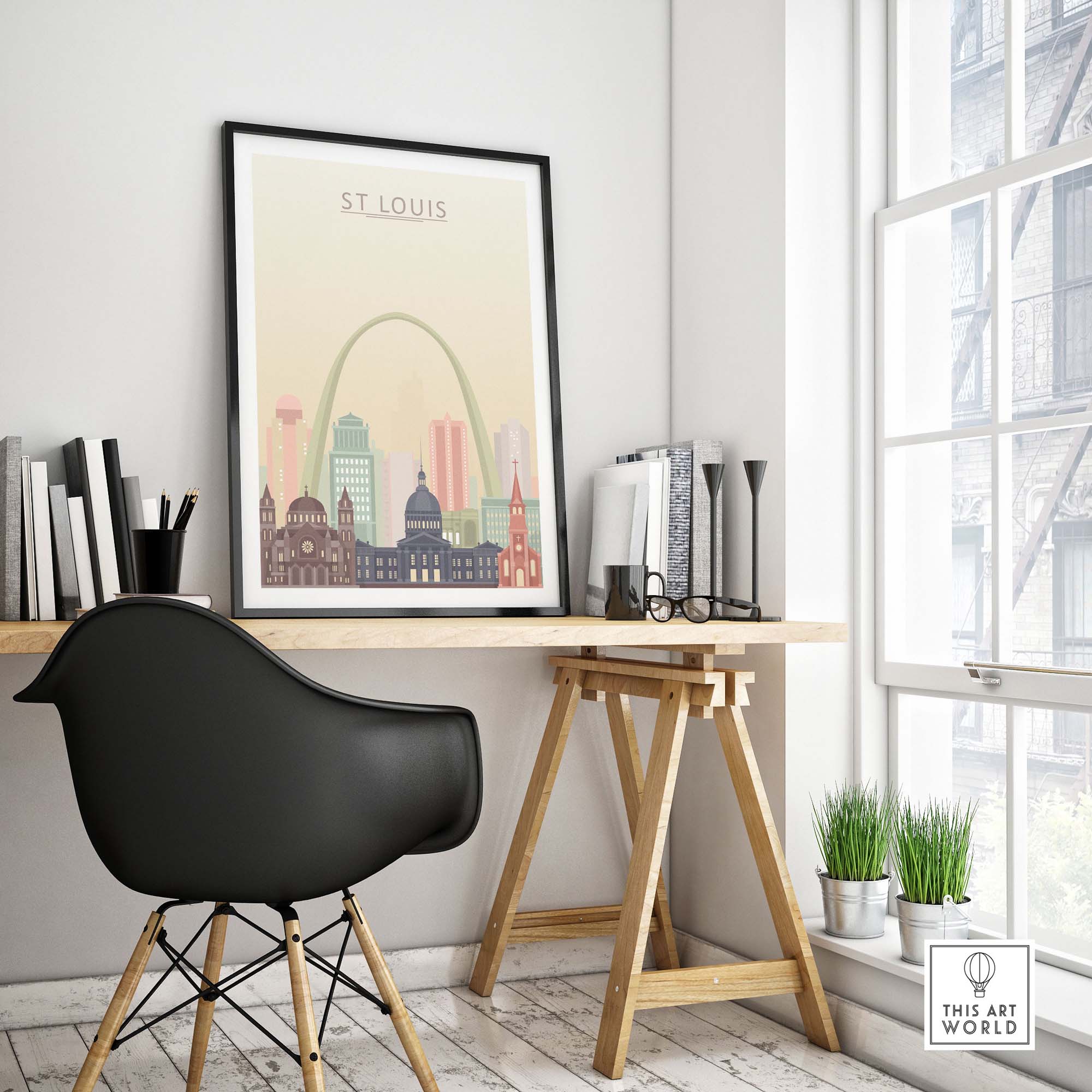 St Louis City Skyline print framed on wall above modern desk in bright office space with plants.