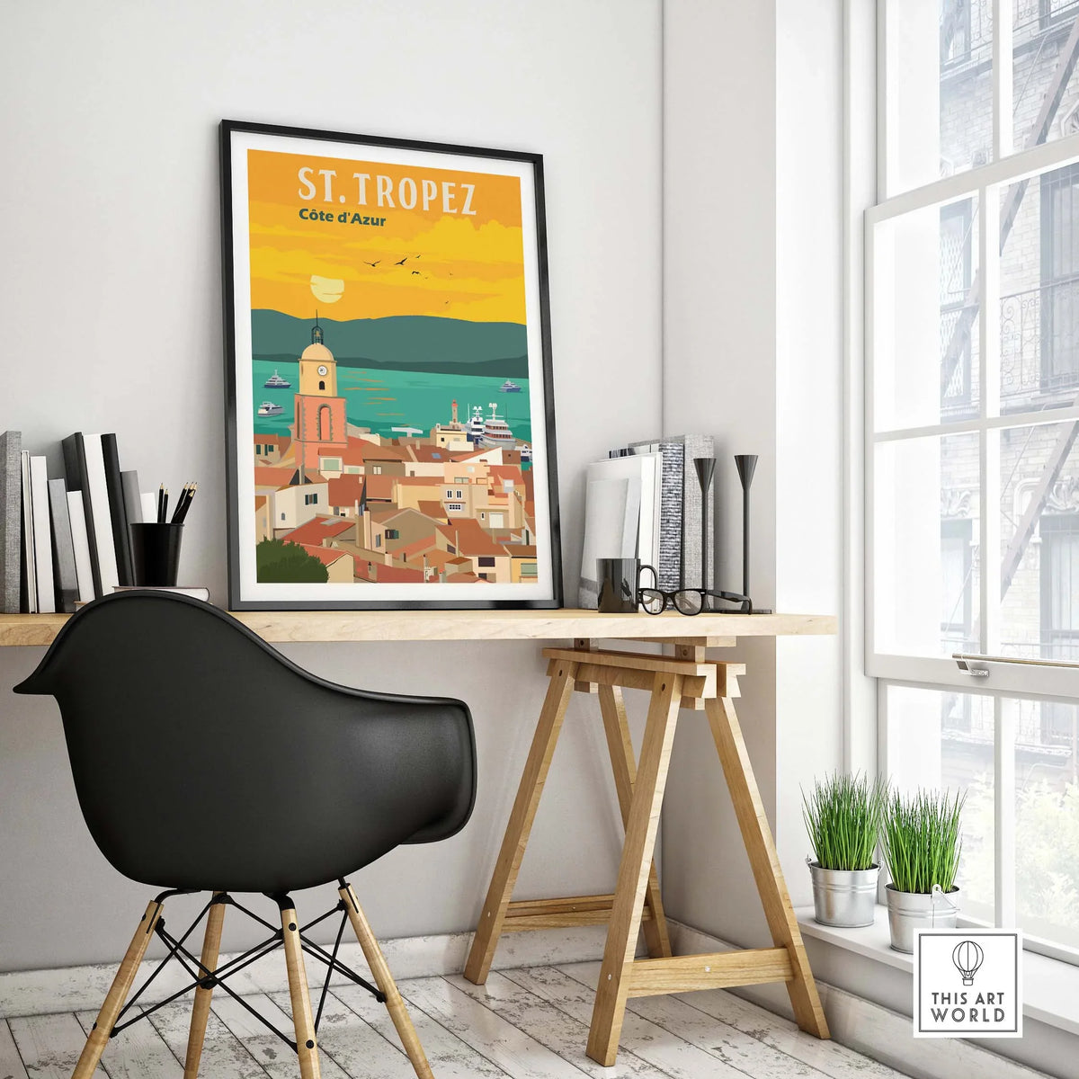 St Tropez France print poster wall art displayed in stylish home office setting with modern furniture.