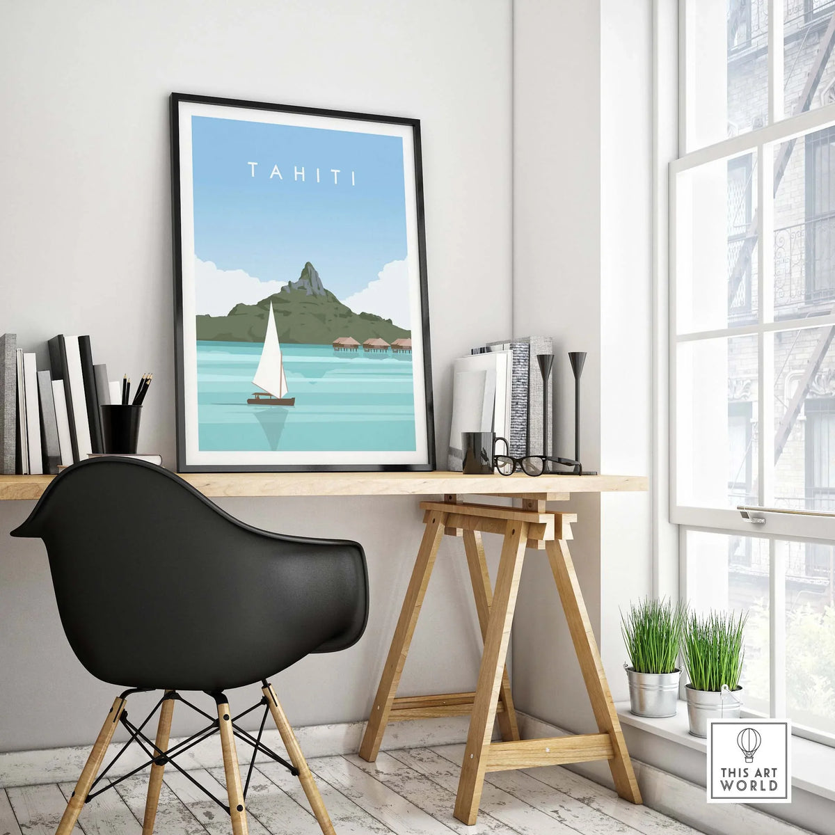 Tahiti travel poster print in stylish home office setting with sailing boat and mountain view.