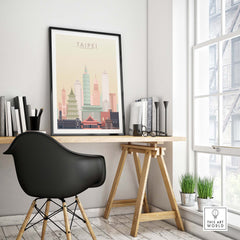 Taipei skyline wall art print displayed in a modern workspace with a black chair and bookshelf decor.