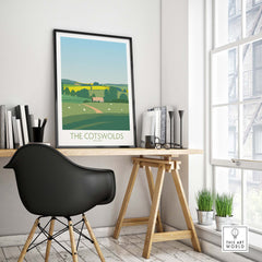 The Cotswolds Print England travel poster displayed in a stylish home office setup.
