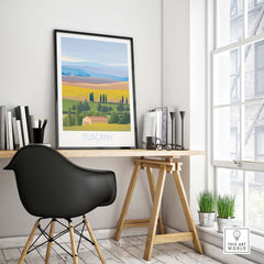 Tuscany Wall Art Print displayed in a modern workspace, featuring vibrant landscapes and a stylish desk setup.