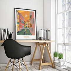 Vintage Venice poster print featuring colorful canals, displayed in a stylish office setting with modern decor.