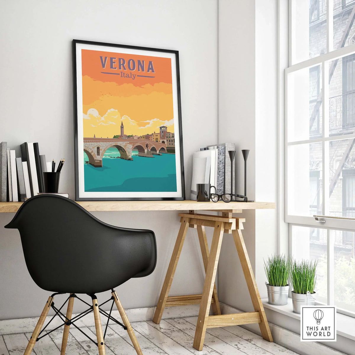 Verona Italy print displayed in a stylish workspace, showcasing vibrant colors and vintage travel poster design.