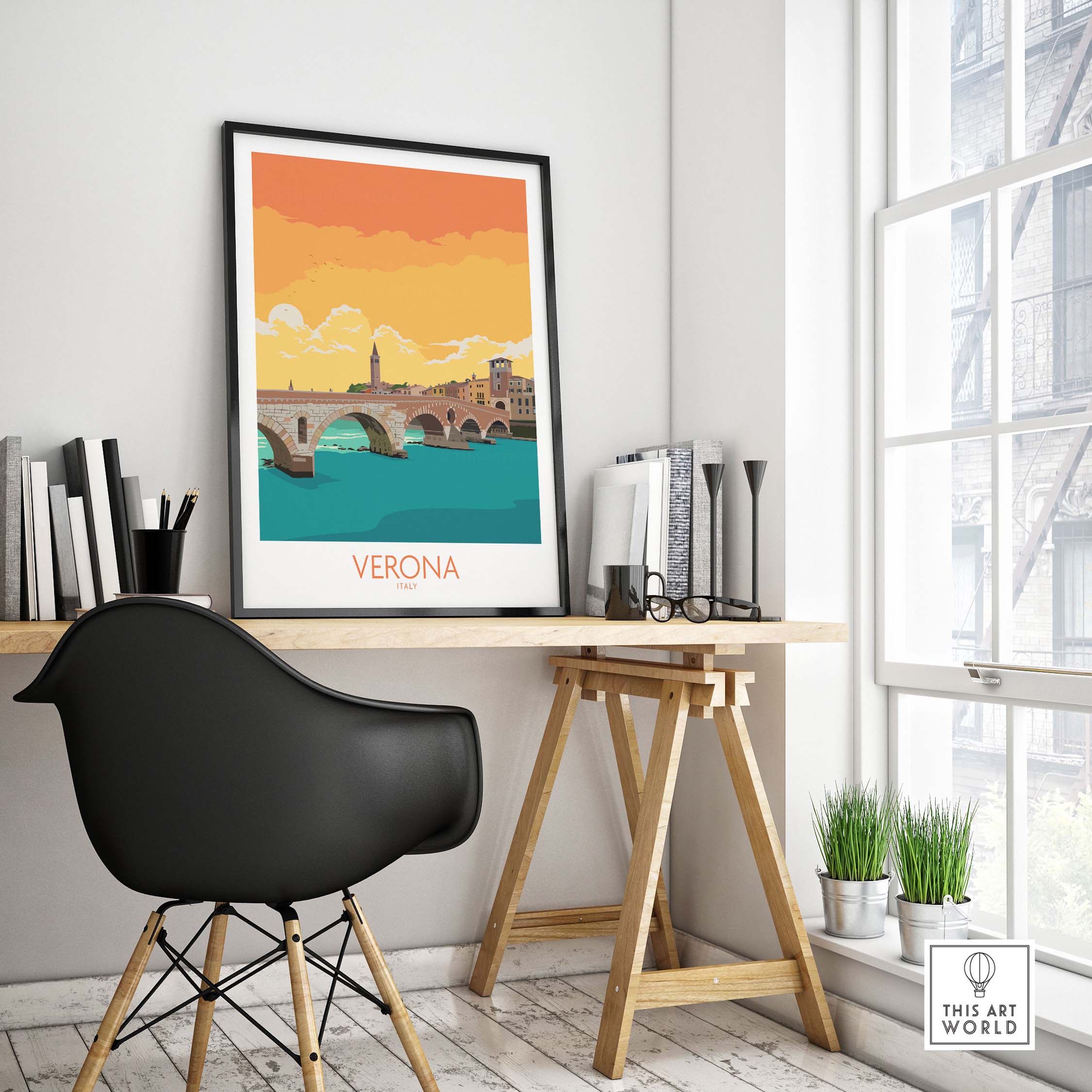 Verona poster art displayed on a stylish desk, featuring a bridge and vibrant sunset colors, perfect for home decor.