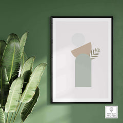 Abstract wall art featuring green and beige shapes with a leaf print, enhancing modern decor in any room.