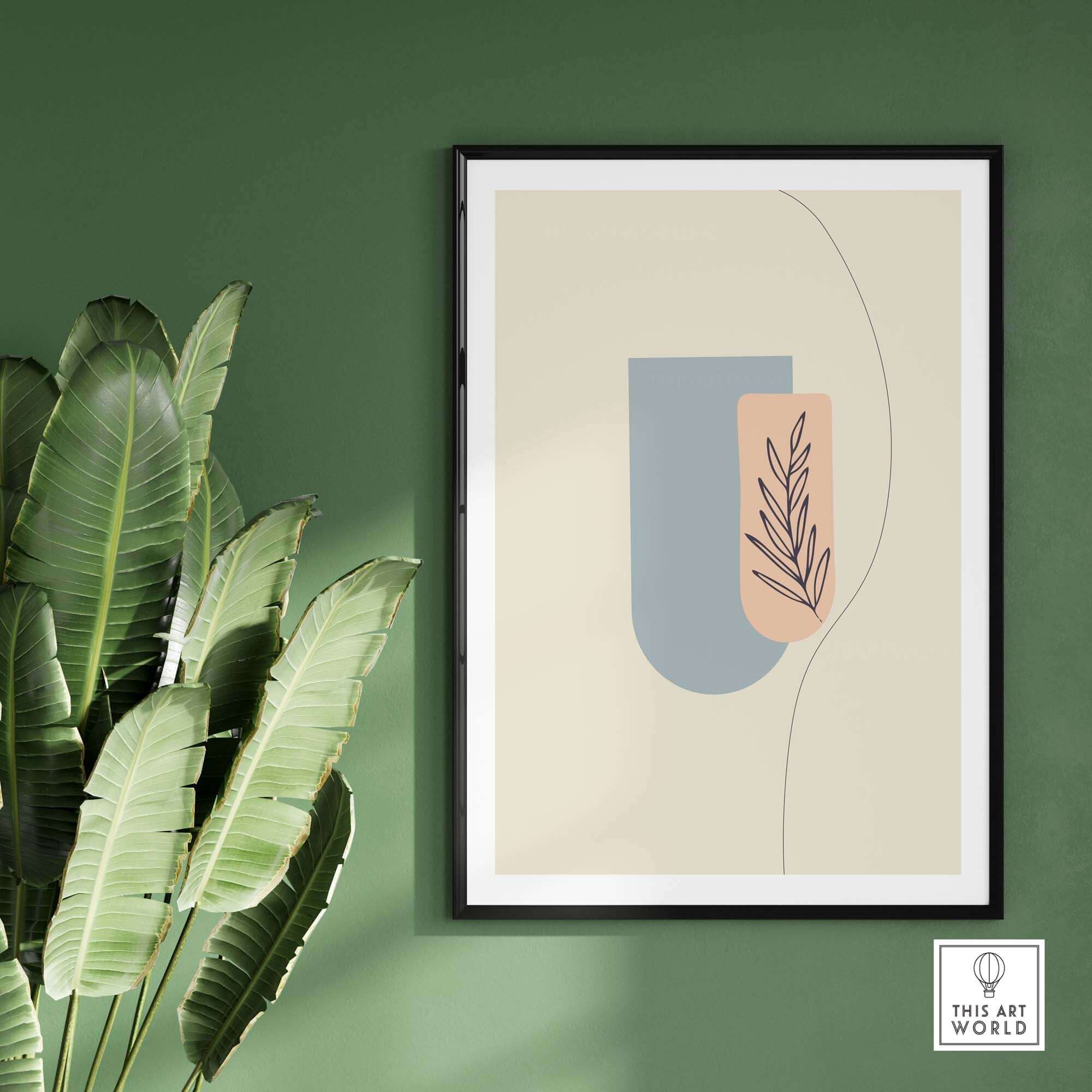 Boho art print featuring abstract shapes and leaves, framed on a green wall with a modern aesthetic.