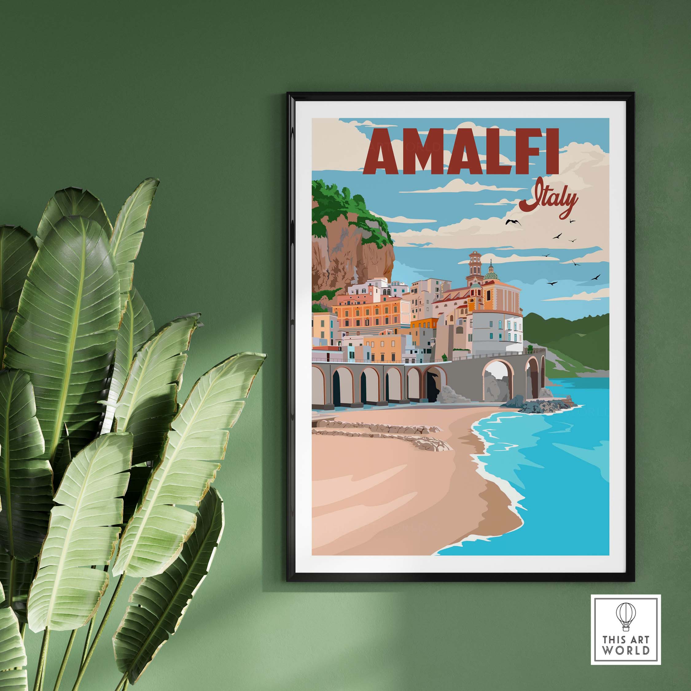 Amalfi Coast Italy vintage poster print on wall with green background and plant, showcasing beautiful coastal scenery.