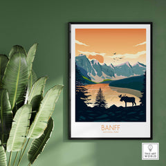 Banff National Park poster art print showcasing a moose and mountains with a sunset backdrop.