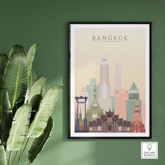 Bangkok Skyline Poster Print showcasing iconic architecture in warm pastel tones against a green wall.