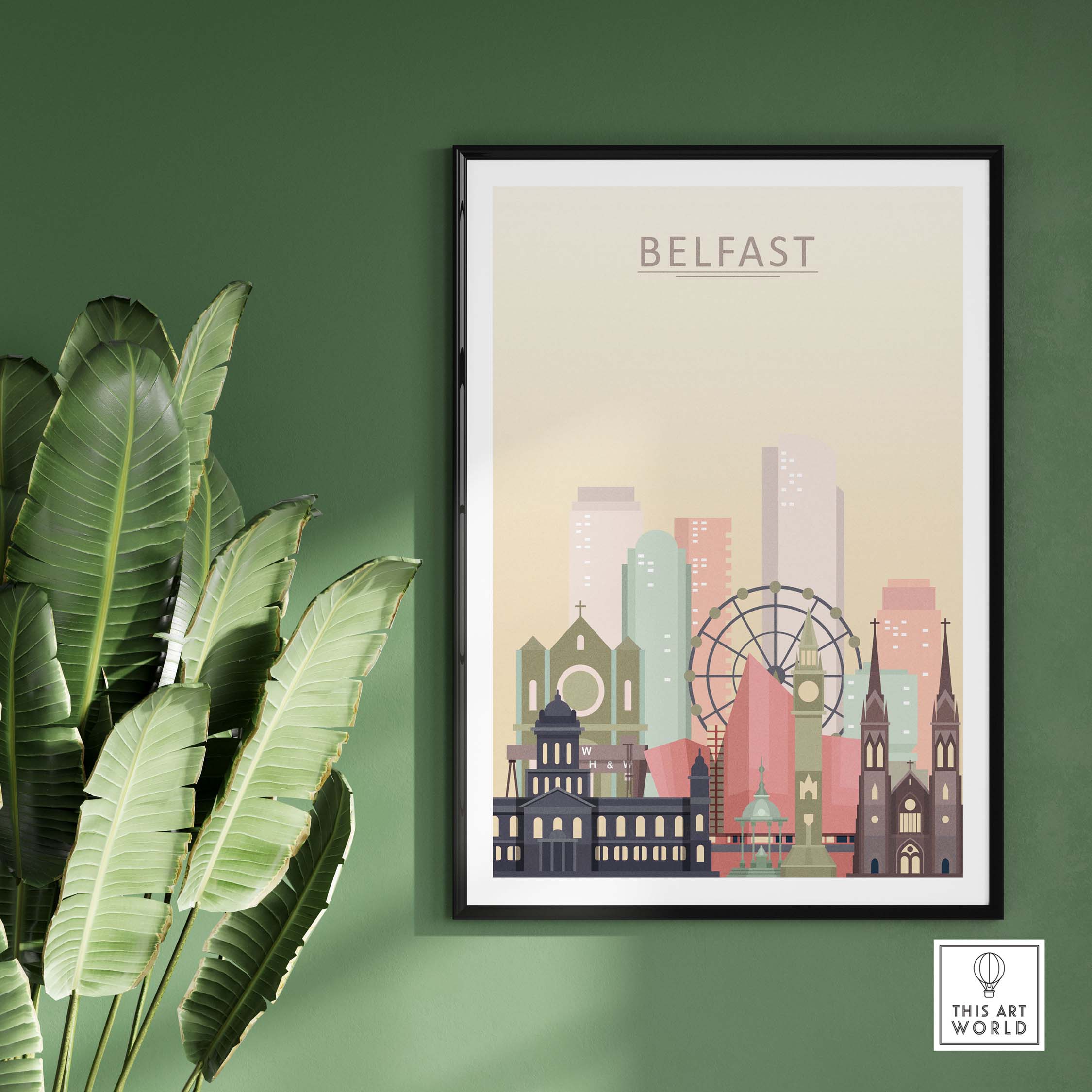 Belfast skyline print in pastel tones, framed on a green wall with a leafy plant, showcasing iconic architecture.