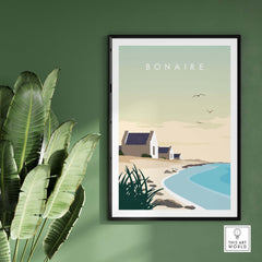 Bonaire travel poster print featuring minimalist beach scene with houses, framed artwork for stylish home decoration.